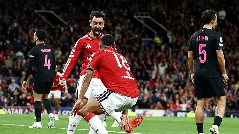 Football - UEFA Champions League - Manchester United v Sabah - Old Trafford, Manchester, Britain - Sept 10, 2026 Manchester United's Bruno Fernandes celebrates scoring their second goal with Youri Tielemans Action Images via Reuters