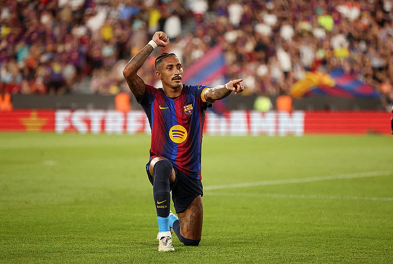 Football - Pre Season Friendly - FC Barcelona v Al Ahly - Spotify Camp Nou, Barcelona, Spain – Aug 19, 2026 FC Barcelona's Raphinha celebrates scoring their second goal REUTERS/Bruna Casas 