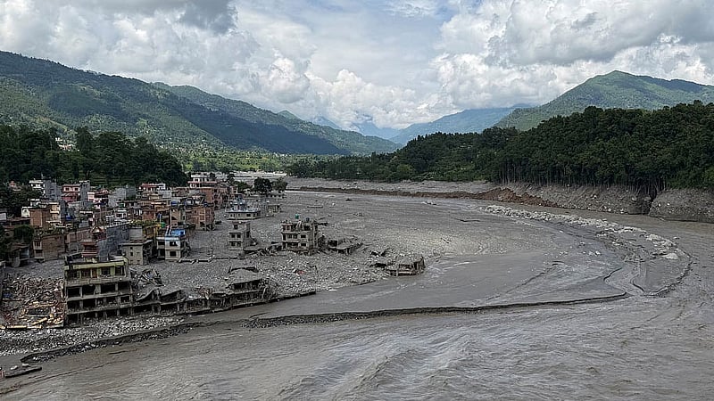 A drone view shows excavators and rescue equipment at the core disaster-hit area at Gyirong Port following the Aug 26 mudslide, in Shigatse, Tibet Autonomous Region, China Sept 1, 2026. Photo: Reuters