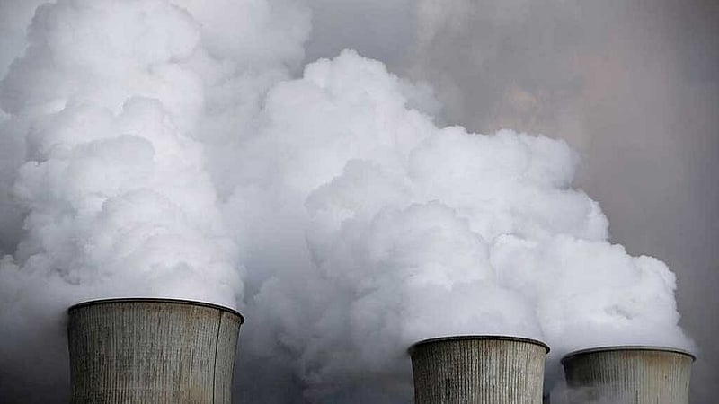Steam rises from the cooling towers of the coal power plant of RWE, one of Europe's biggest electricity and gas companies in Niederaussem, Germany, March 3, 2016. REUTERS