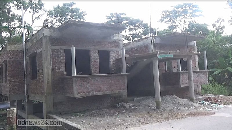 Jamal Member is building another house next to his old home.