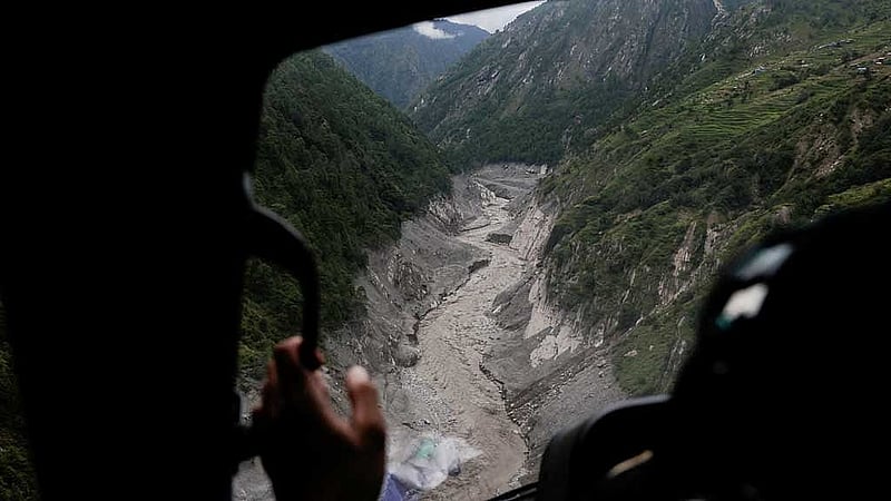 FILE PHOTO: Floodwater marks remain along the banks of the Bhote Koshi River, as seen from a helicopter, following the deadly flash floods and mudslides in Rasuwa district, Nepal, Sept 3, 2026. REUTERS