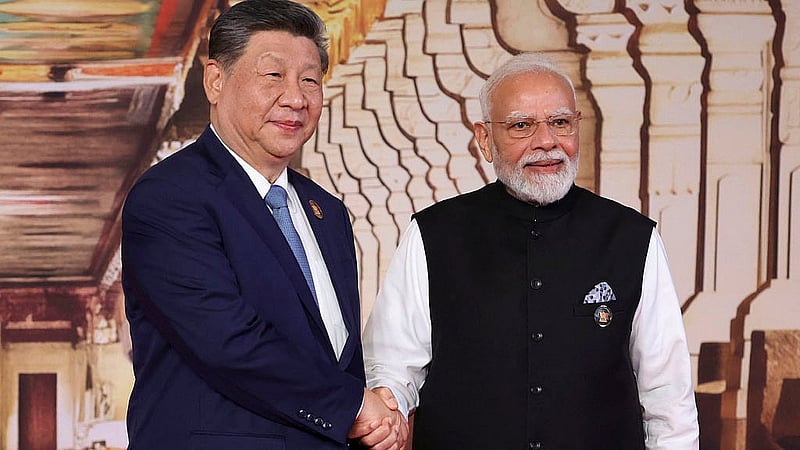 Indian Prime Minister Narendra Modi welcomes Chinese President Xi Jinping at the BRICS summit in New Delhi, India, September 12, 2026. Photo: Reuters