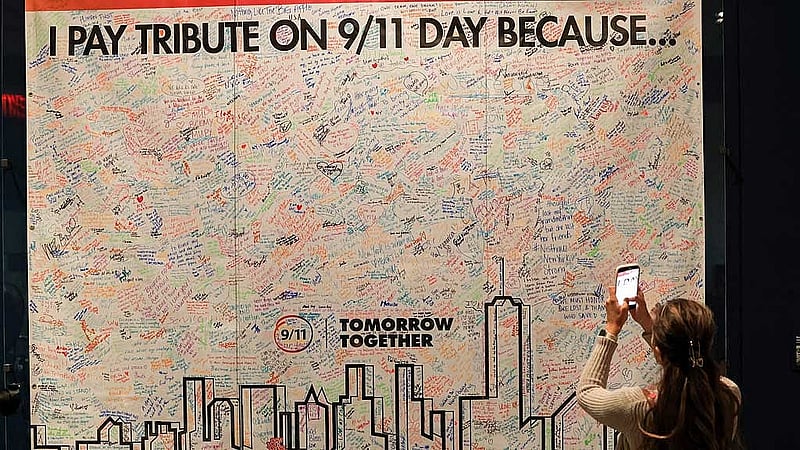 A journalist films a video during a preview of the 9/11 Memorial &amp;amp; Museum’s newest exhibition, ‘In Their Honor: 25 Years of 9/11-Inspired Service,’ in New York, US, Aug 31, 2026. REUTERS/Brendan McDermid