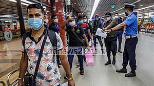Malaysia detains 27 Bangladeshis over 'work pass fraud'