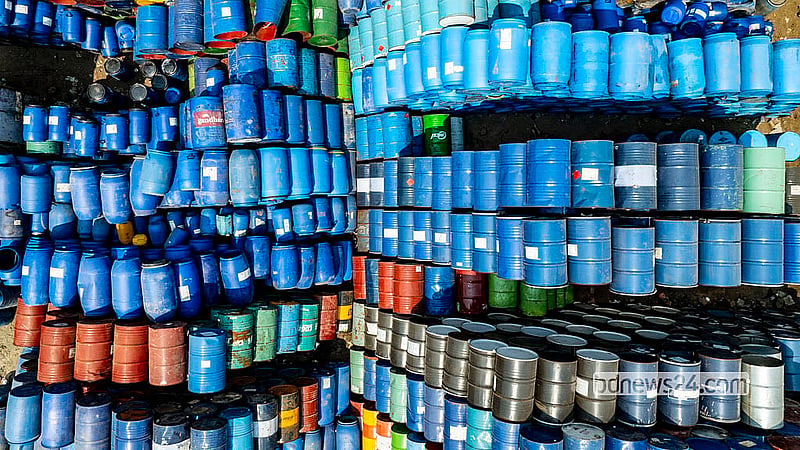 A stack of old drums fills a shop in Old Dhaka’s Islambagh. Traders from parts of the country buy the drums, refurbish them for reuse and sell them on. Photo: Mostafigur Rahman