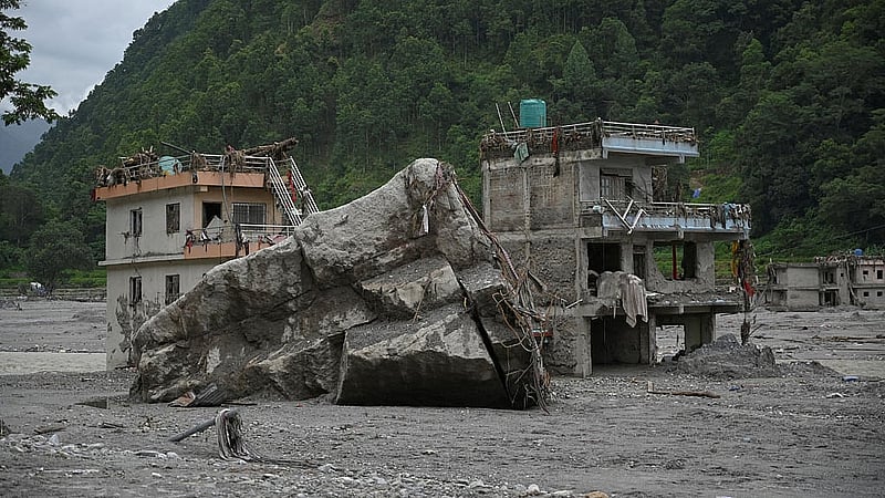 Buildings damaged and covered in mud near Trishuli River following deadly flash floods and a mudslide, in Betrawati Bazaar in Rasuwa district, Nepal, Aug 30, 2026. REUTERS/Stringer