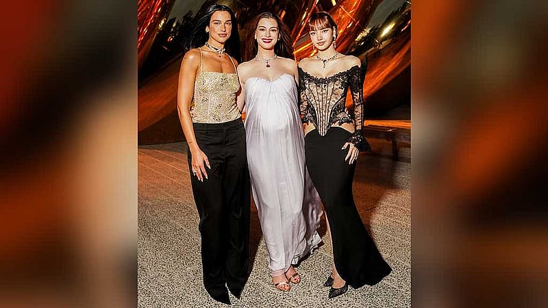 Dua Lipa, Anne Hathaway, and Lisa. Photo: Facebook/Vogue