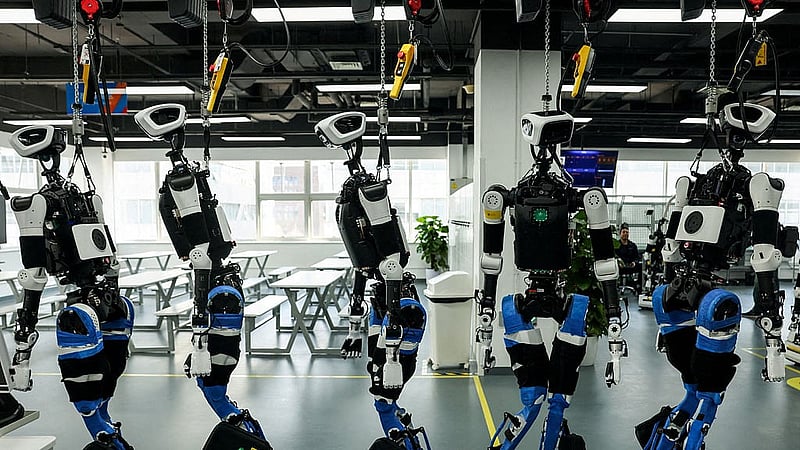 Humanoid robots appear at the production line during organized media tour to the Robotics Pilot Testing and Validation Platform of Beijing Innovation Center of Humanoid Robotics (X-Humanoid) in Beijing, China, Mar 20, 2026. REUTERS/Maxim Shemetov To Match Special Report CHINA-TECH/ROBOT