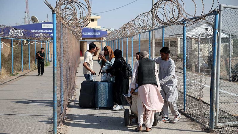 Afghan migrants in Iran war return to Taliban rule