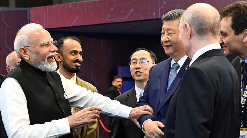 Russia's President Vladimir Putin, China's President Xi Jinping and India's Prime Minister Narendra Modi speak during the BRICS summit in New Delhi, India, Sept 12, 2026. Photo: Reuters