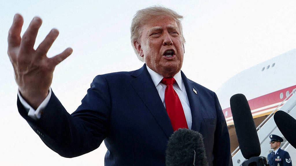Trump lashes out at Fed after Warsh backs rate hike
