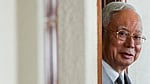Malaysia pardons board members at palace amid speculation of meeting on Najib clemency