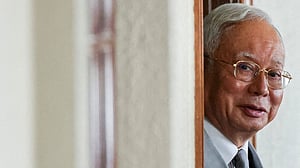 Malaysia pardons board members at palace amid speculation of meeting on Najib clemency
