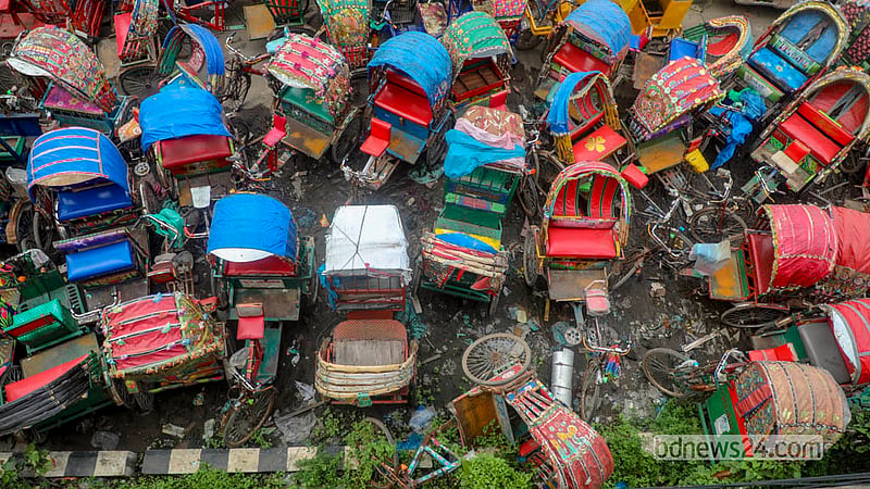 Seized rickshaws deteriorate after being left at the dumping station near Postogola Bridge in Shyampur for a long time. Photo: Abdullah Al Momin
