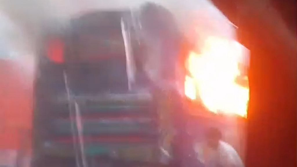 Parked bus set on fire in Pallabi