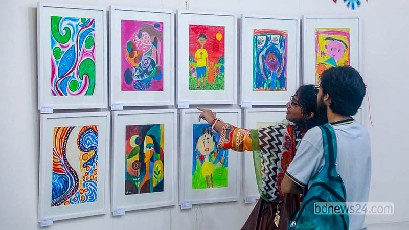 Visitors explore the seven-day Children’s Art Exhibition at the Zainul Gallery of Dhaka University's Faculty of Fine Art.  Photo: Abdullah Al Momin
