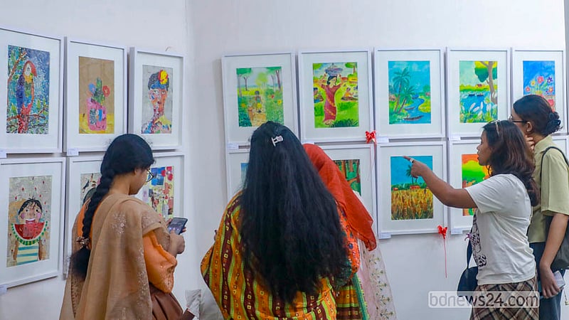 Visitors explore the seven-day Children’s Art Exhibition at the Zainul Gallery of Dhaka University's Faculty of Fine Art.  Photo: Abdullah Al Momin