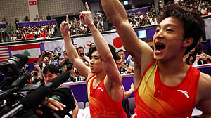 China beat Japan to retain gymnastics gold
