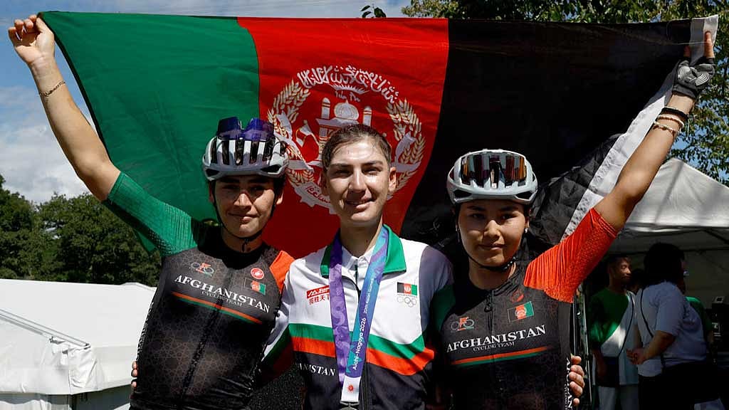 Afghan cyclist who disguised herself as a man to train wins Asian Games silver