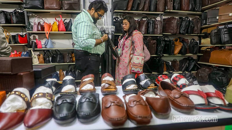 A variety of leather products are arranged for sale at a stall during a leather and footwear industry exhibition.  Photo: Abdullah Al Momin