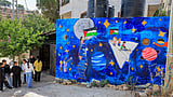 Palestinian children paint hopes beyond West Bank checkpoints