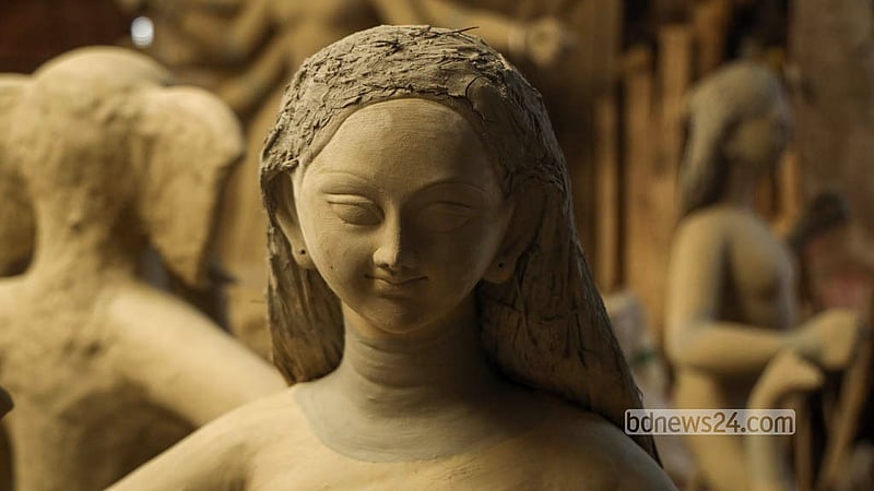 Artisans work on idols of Goddess Durga, Lakshmi, Saraswati, Kartik and Ganesha ahead of Durga Puja. Photo: Shamsul Haque Ripon