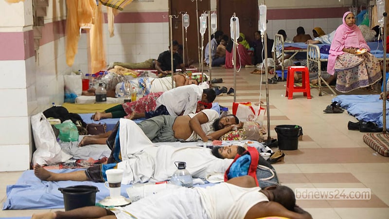 Patients spread out on makeshift bedding after failing to find beds in the dengue ward at Mugda Medical College Hospital in Dhaka. Photo: Shamsul Haque Ripon