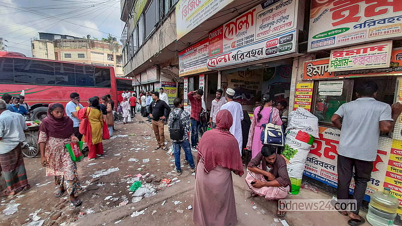 Passengers gather in front of the ticket counters at Fulbaria Inter-district Bus Terminal, where buses leave for several southern districts. Photo: Abdullah Al Momin