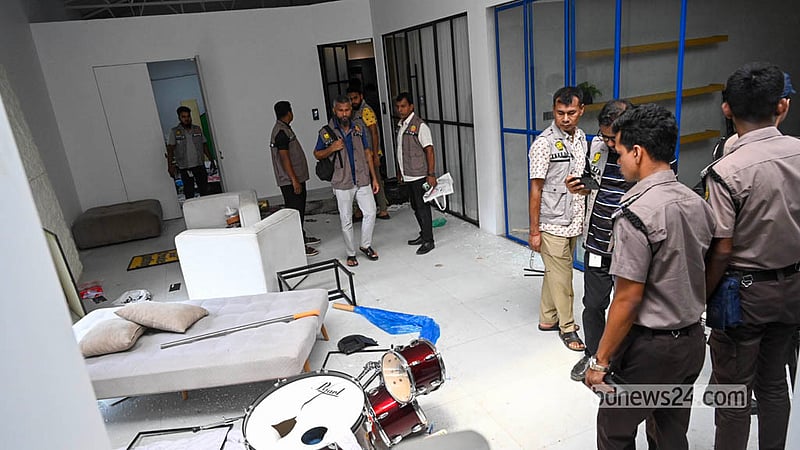 Police and Detective Branch officers inspect the site after the attack on content creator Salman Muqtadir's studio at ECB Chattar.