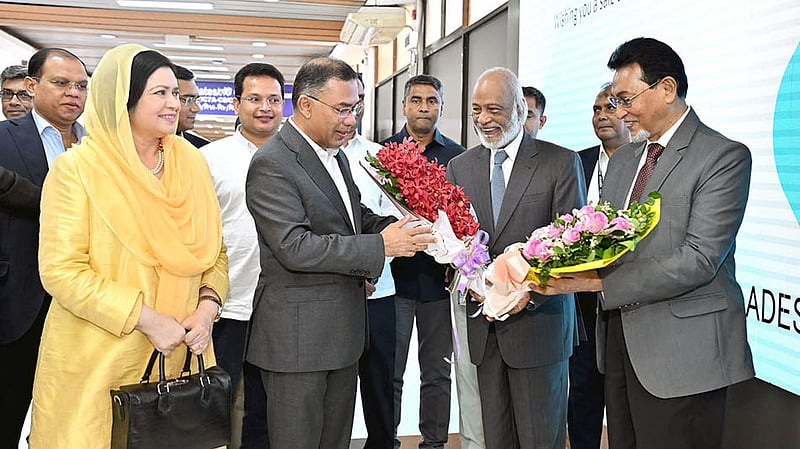 Prime Minister Tarique Rahman returns home from New York on Sunday, Sept 27, 2026, after attending the UN General Assembly's 81st session, greeted with flowers at Shahjalal International Airport by Local Government Minister Abdul Moyeen Khan, Chief Whip Nurul Islam Moni and senior officials.