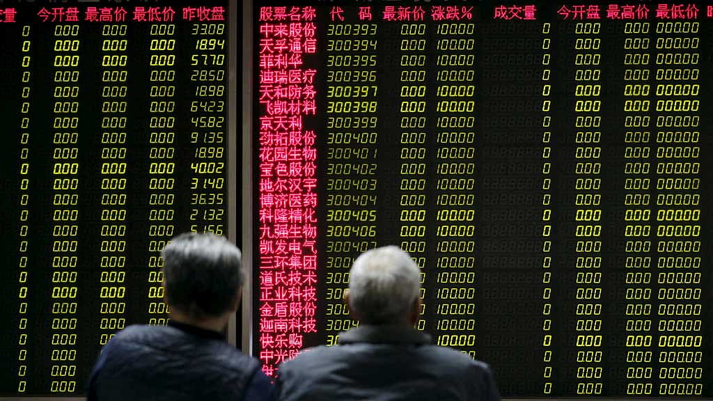 Stocks slip in Asia as oil climbs, bonds retreat