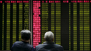 Stocks slip in Asia as oil climbs