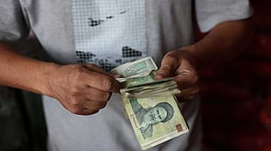 War squeezes Iranian households from all sides