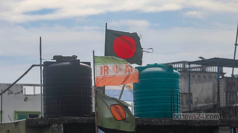 During the football World Cup, flags of different countries, including Bangladesh’s, were hoisted on rooftops across Dhaka. Months after the tournament ended, many remain in place, their colours faded and fabric torn by exposure to sun and rain. Under Bangladeshi law, displaying a torn, damaged, or faded national flag is an offence. Photo: Abdullah Al Momin
