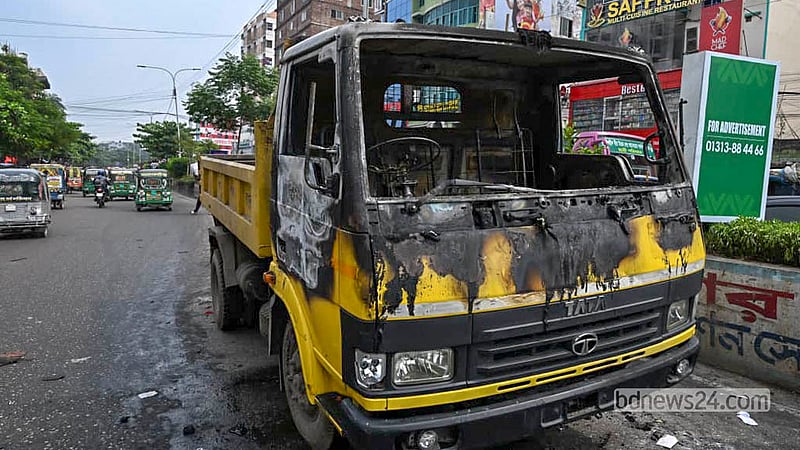 Hawkers set fire to several Dhaka North City Corporation vehicles during a drive to clear illegal structures from the Mirpur-10 footpath on Wednesday, Sept 30, 2026.