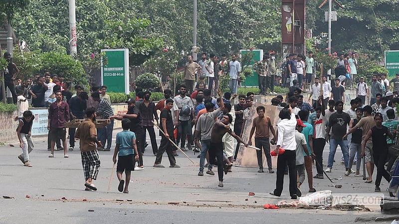 Hawkers clash with police during a drive to clear illegal structures from a footpath in Dhaka’s Mirpur-10.