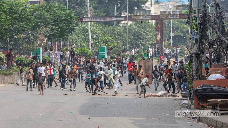 Hawkers clash with police during a drive to clear illegal structures from a footpath in Dhaka’s Mirpur-10.