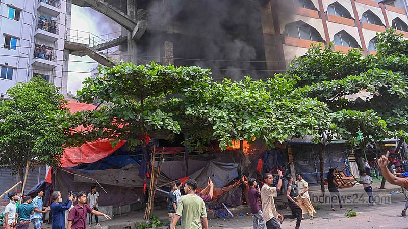 A temporary shop damaged by a fire sparked by an electrical short circuit during the footpath eviction drive at Dhaka’s Mirpur-10.