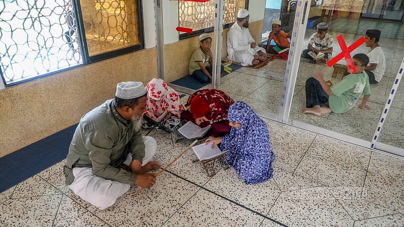 Children receive Arabic lessons after Zuhr prayers every day at this mosque at Zinjira’s Hawli in Keraniganj. Photo: Abdullah Al Momin