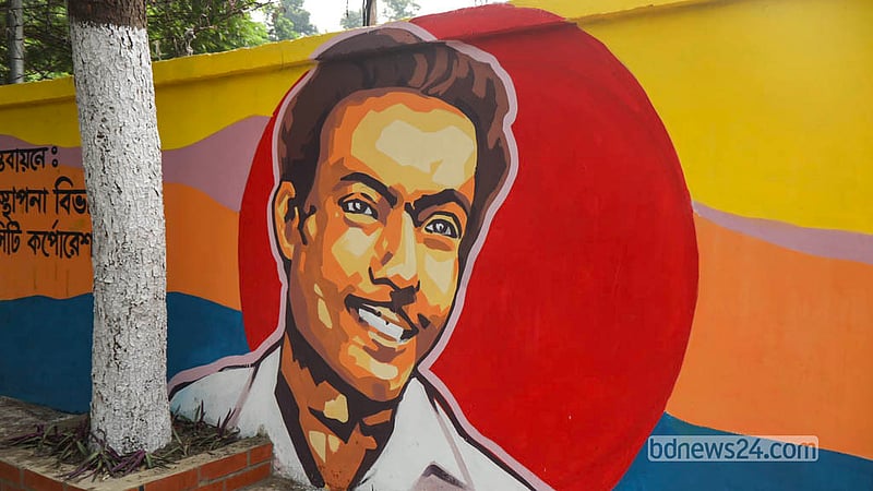 Portraits of 10 celebrated figures, including Rabindranath Tagore, Kazi Nazrul Islam, Fakir Lalon Shah, Zainul Abedin, Satyajit Ray and actor Humayun Faridi, adorn the wall opposite the Bangladesh Shilpakala Academy. Photo: Shamsul Haque Ripon