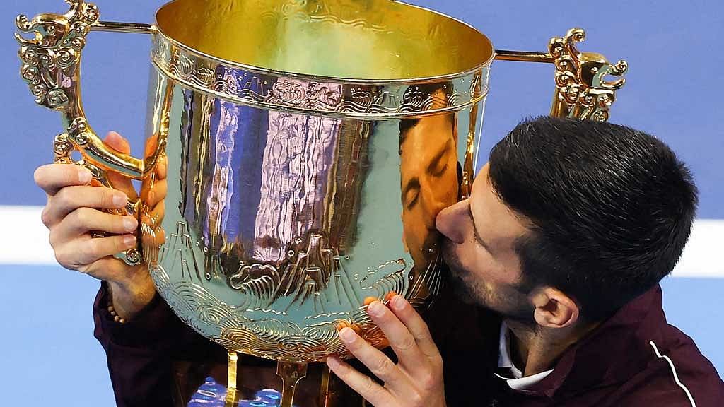 Djokovic wins China Open as De Minaur retires injured
