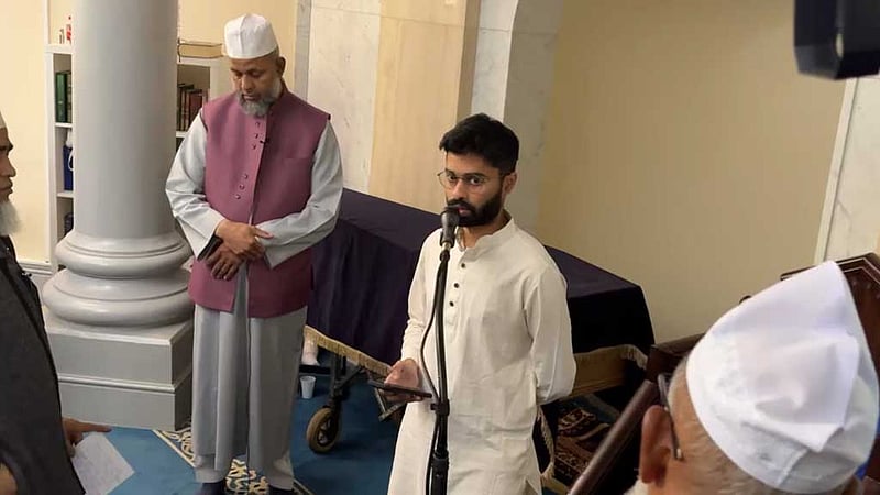 Raad Sharaar Khalidi, son of late bdnews24.com editor-in-chief and publisher Toufique Imrose Khalidi, speaks before his father’s funeral prayer at Brick Lane Jamme Masjid in East London on Thursday, Oct 8, 2026.