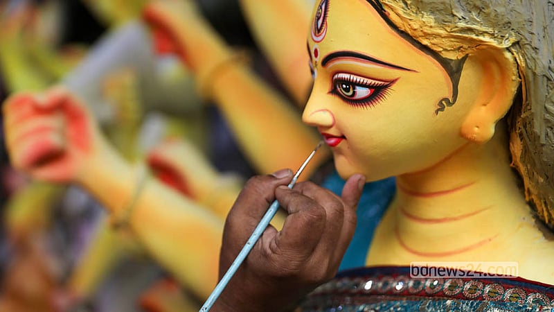 Artists spare no effort to dress and adorn the goddess in her many forms for the approaching festival. Photo: Shamsul Haque Ripon