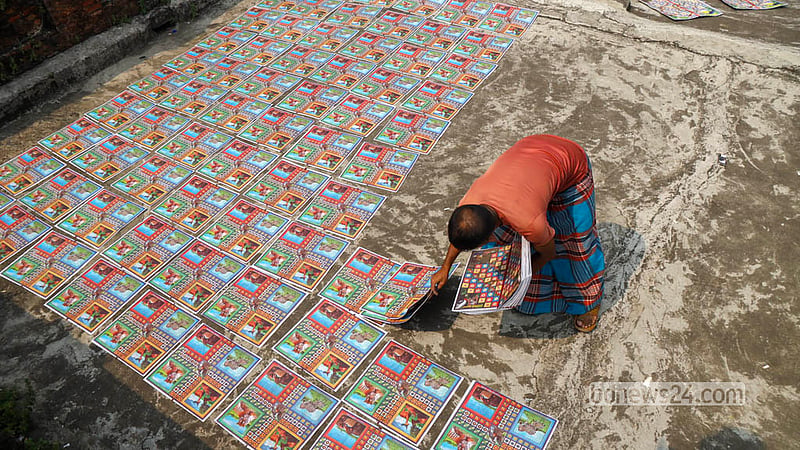 Ludo boards made at the Quader Ludo Factory in Chhoto Katra in Old Dhaka’s Chawkbazar are put out to dry. Photo: Shamsul Haque Ripon