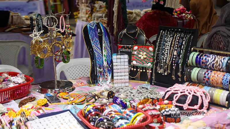 Handmade jewellery items made by women entrepreneurs taking part in the Autumn Fair attract the attention of buyers. Photo: Shamsul Haque Ripon
