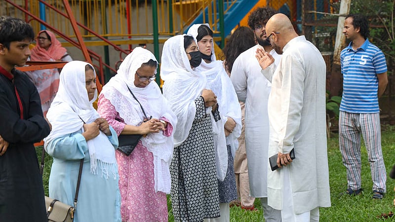 The coffin of Toufique Imrose Khalidi, the late editor-in-chief and publisher of bdnews24.com, rests at Banani’s Old DOHS playground, where friends, family, colleagues and well-wishers gather to honour his life and bid him farewell.