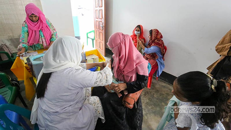 A health worker at the Radda MCH-FP Centre administers a vaccine to a child following the renovation of the facility in Mirpur 1. Photo: Shamsul Haque Ripon