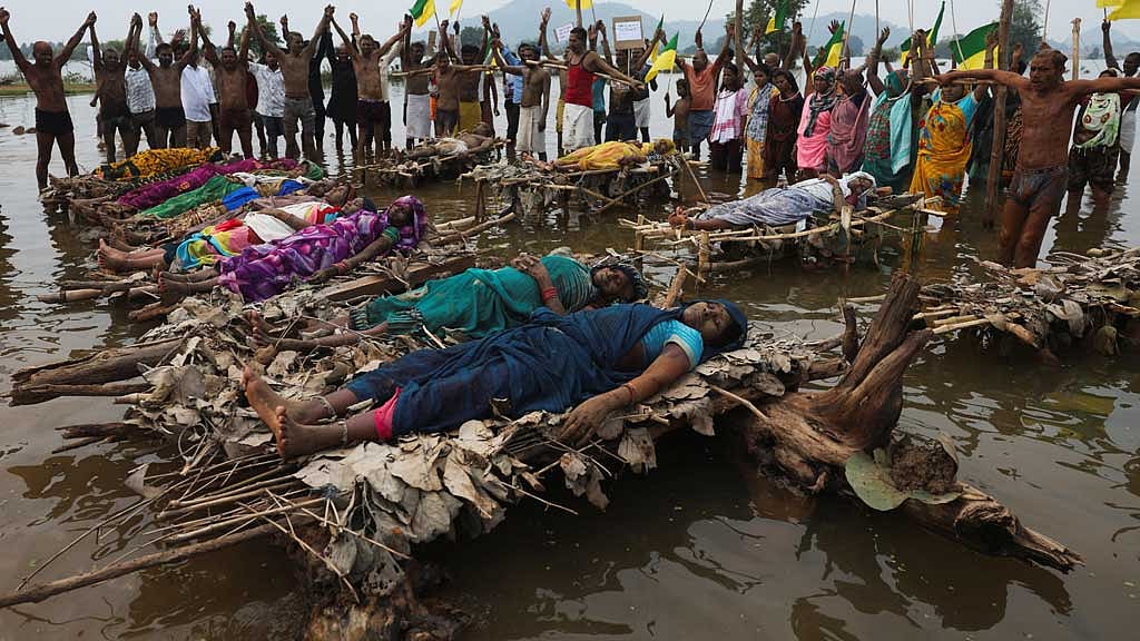 As rising waters flood homes and temples, villagers protest India's $87 billion river-linking project