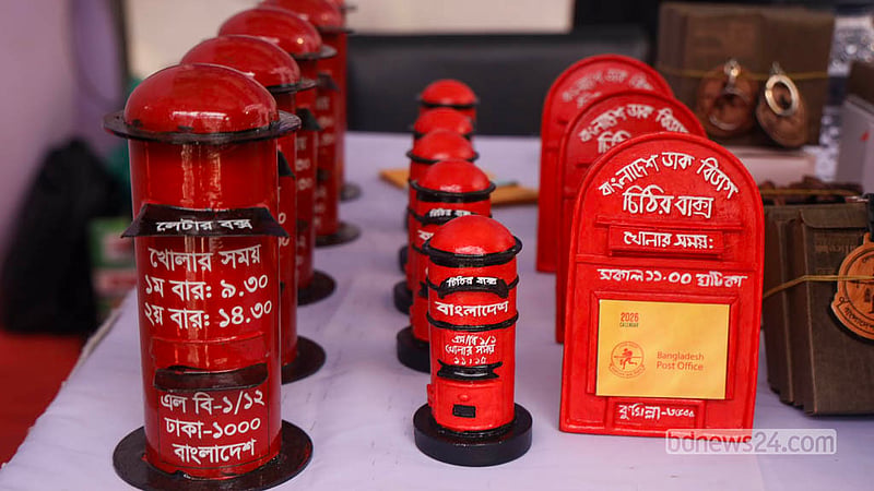 Replicas of red letter boxes in different sizes are on display at the Letter Festival and Postage Stamp Exhibition, highlighting a familiar symbol of traditional postal communication on Monday, Oct 12, 2026. Photo: Shamsul Haque Ripon
